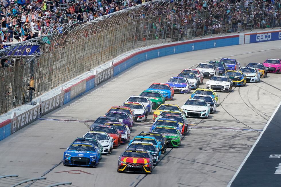 The green flag starts a NASCAR Cup Series auto race at Texas Motor Speedway in Fort Worth,...