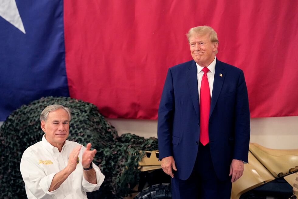 Republican presidential candidate and former President Donald Trump, right, is introduced by...