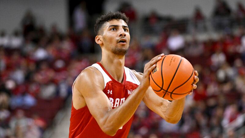 Bradley forward Malevy Leons (14) shoots a free throw against Arkansas during an NCAA college...