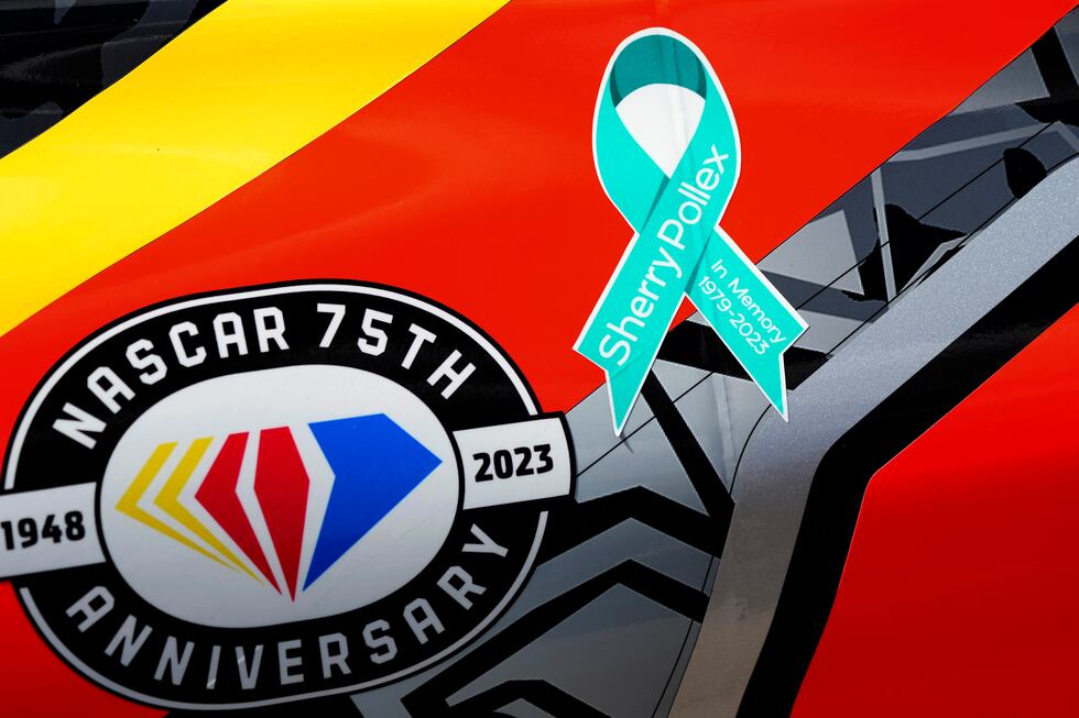 A sticker in memory of Sherry Pollex is displayed on Martin Truex Jr.'s car before a NASCAR...