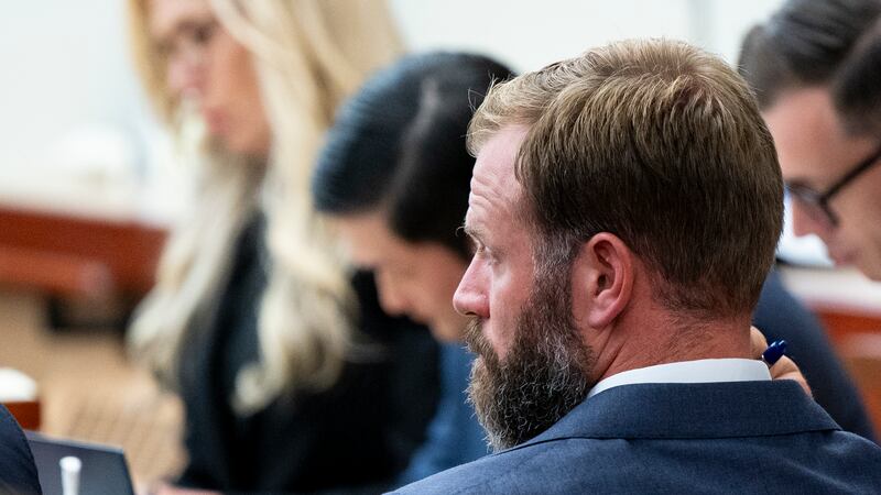 Defendant Matthew Collins looks on while the state gives opening statements during the trial...