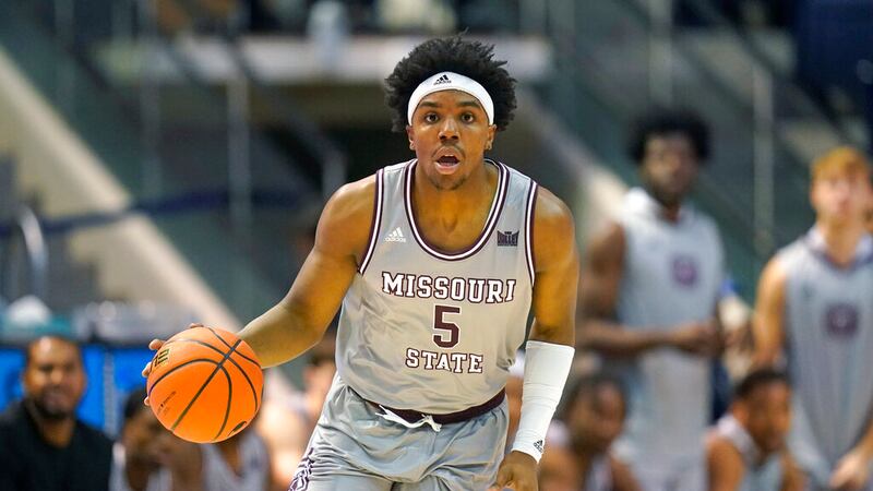 Missouri State guard Donovan Clay (5) brings the ball up court during the first half of an...