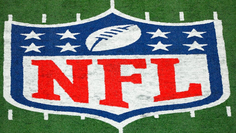 FILE - The NFL logo is seen at a stadium on Nov. 2, 2020, in East Rutherford, N.J. Hundreds of...